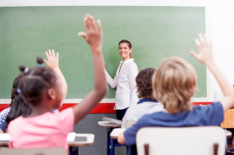 Teacher At The Front Of A Classroom 1024x677